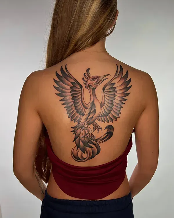 Transform your back into a canvas of rebirth and resilience. Book your bespoke black and grey mythological backpiece with experienced artist Daisuke Sakaguchi at Silent Moon Tattoo (London SE16).