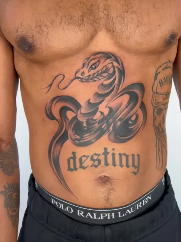 Bespoke Black & Grey Snake and Script Stomach Tattoo | Daisuke Sakaguchi
