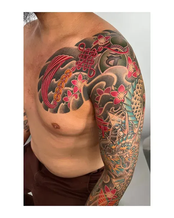 Command the canvas with a vibrant, heritage-driven masterpiece. Book your bespoke full-color Japanese dragon sleeve and chest panel with experienced artist Daisuke Sakaguchi at Silent Moon Tattoo (London SE16).