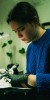 Focused Precision: Lubava, one of London's premier tattoo artists, at work on a custom illustrative piece in her SE16 studio.
