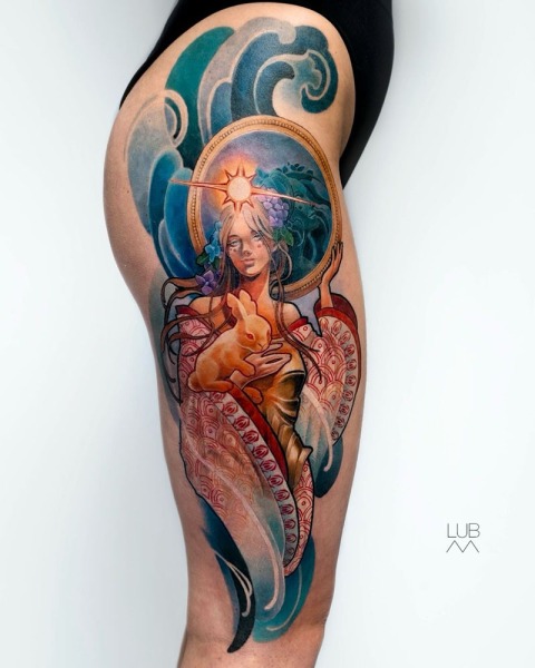 A celestial journey on skin: This custom illustrative piece by Lubava features a goddess-like figure and her golden hare, framed by traditional Japanese waves and intricate patterns