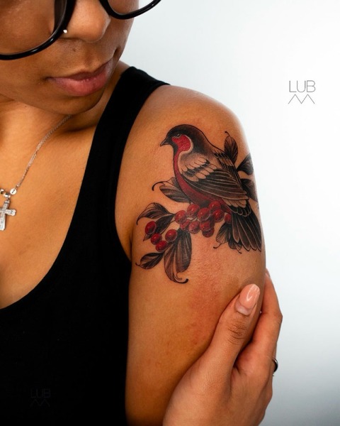 Nature in bloom: A custom illustrative bullfinch and rowan berry piece by Lubava, showcasing rich color saturation and fine-line detailing.